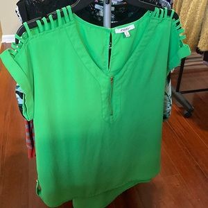 Green shoulder reveal blouse.